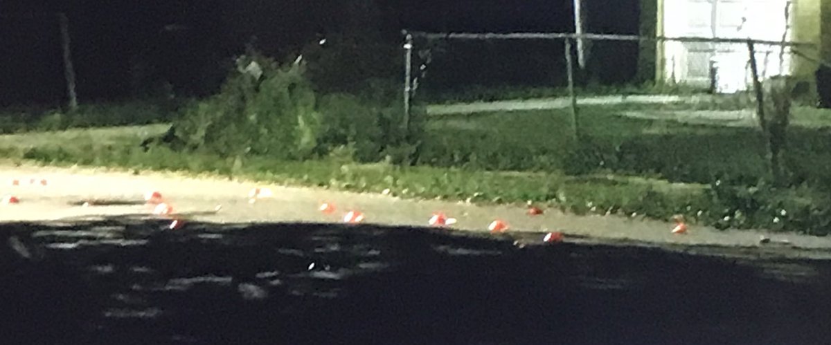 Around the corner evidence technicians have dozens of markers laid out trying to find any evidence of what took place