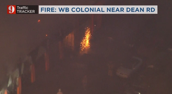 Fire crews battling flames off Colonial near Dean Rd. WB Colonial SHUT DOWN
