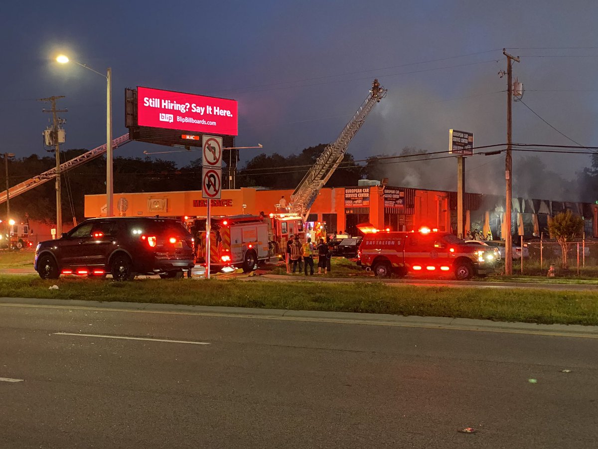 OCFireRescue on the scene of a fire at an auto repair shop on E Colonial Dr near Dean Rd. Extensive damage inside. WB Colonial is blocked as crews work to extinguish the flames