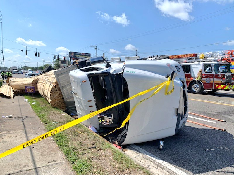 Traffic Crash 9:49 a.m. Clarcona-Ocoee Road/North Orange Blossom Trail: tractor-trailer hauling a load of lumber overturned; firefighters freed the driver who was pinned in the cab. He was transported to @orlandohealth Regional Medical Center with serious injuries.