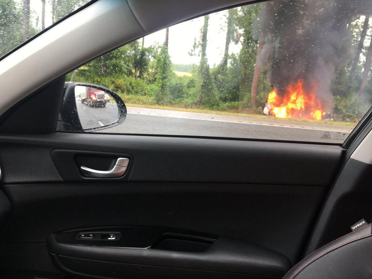 Car fire, I-95 just south of the exit for 210. 
