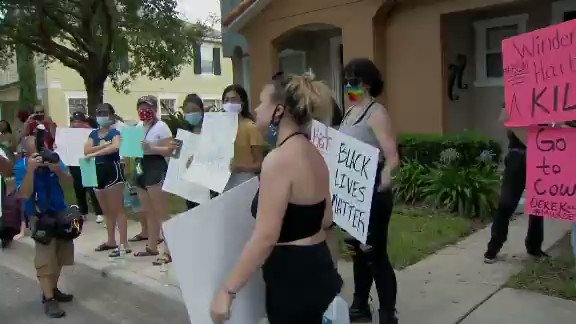 Protesters gathered outside a central Florida home owned by the former Minneapolis police officer charged in George Floyd's death