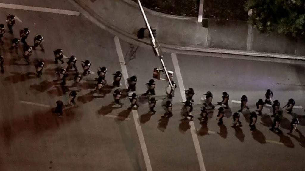 38 arrests tonight by @miamidadePD after peaceful protests in Miami turn chaotic. Cars on fire near Miami PD & looting, mostly at Bayside Marketplace. @CBSMiami