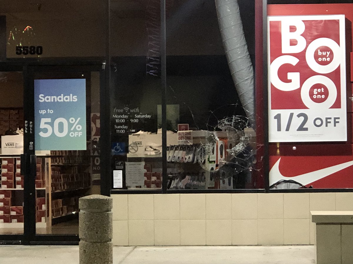 Glass was also smashed at Famous Footwear at International Outlet. Near International Drive 
