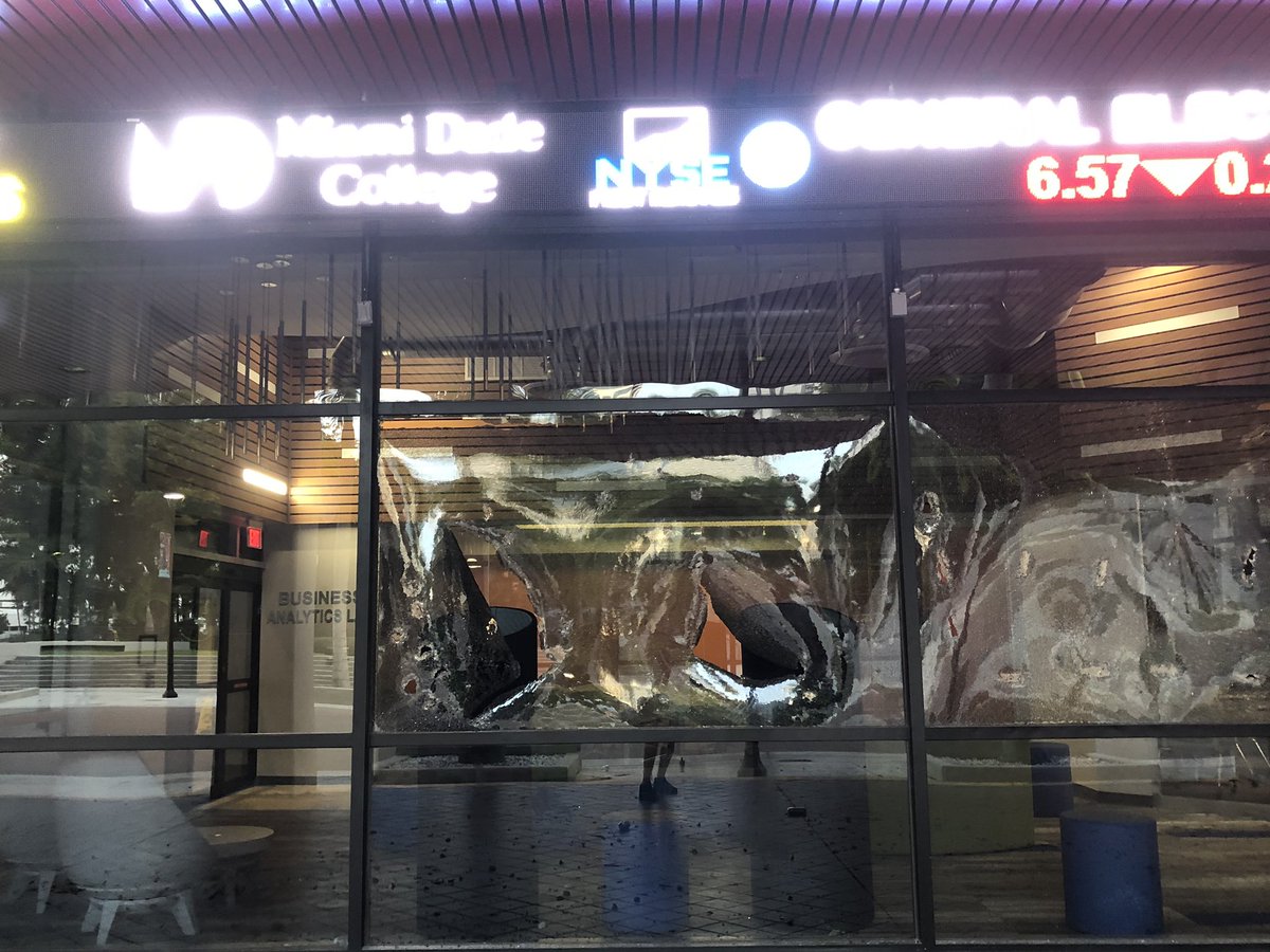 Smashed window at Miami Dade College's downtown campus and ransacked vending machines, but most of campus looks untouched, beyond graffiti