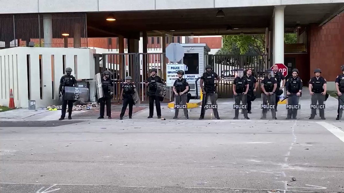 Police are still out in downtown Miami the morning after protests. A few burned police cars in the area too