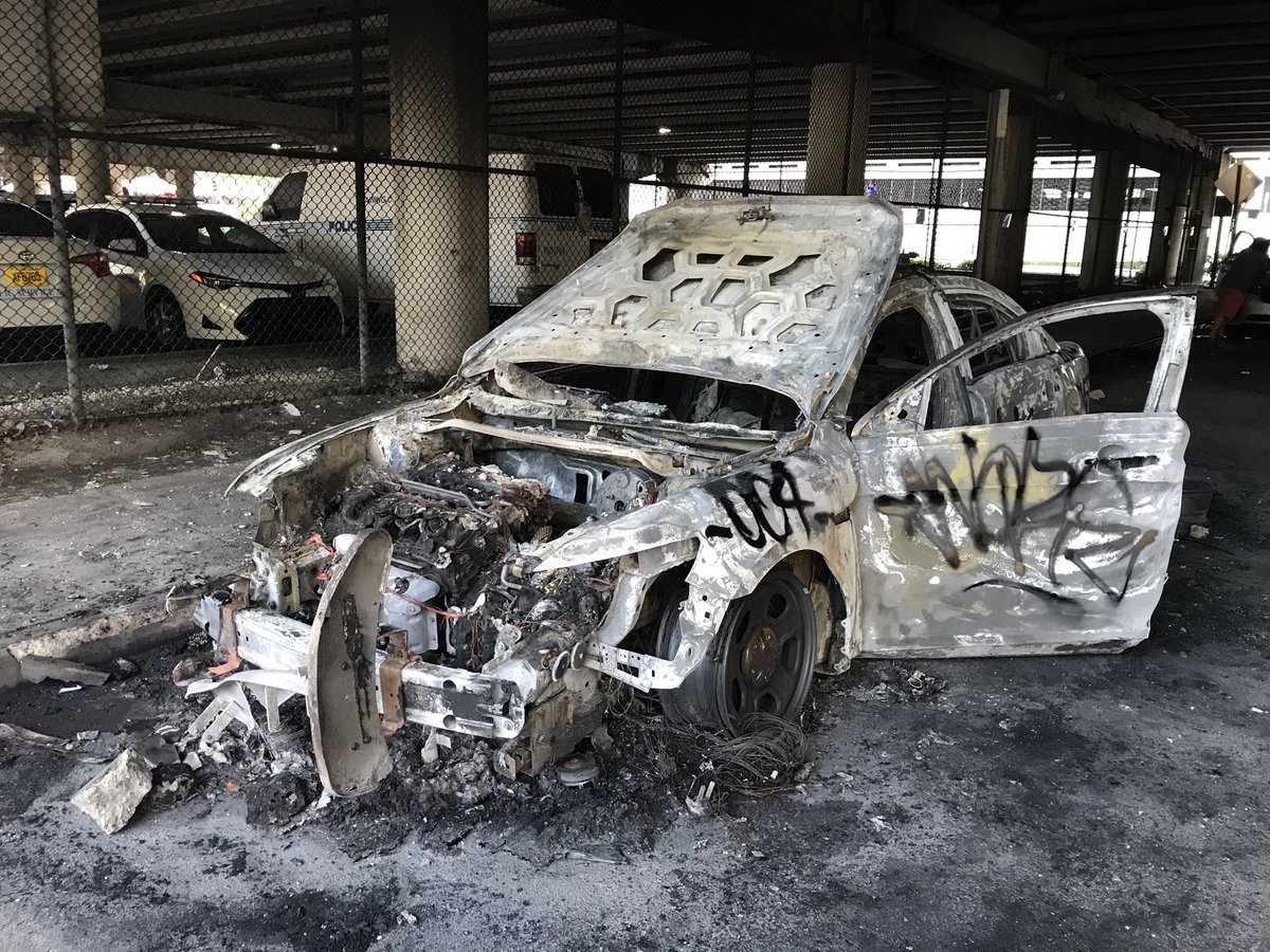 Some of what's left after yesterday's protest in Downtown Miami turned violent. Charred police cars, smashed glass, and graffiti. Still, a much calmer scene this morning than the images we saw last night. 