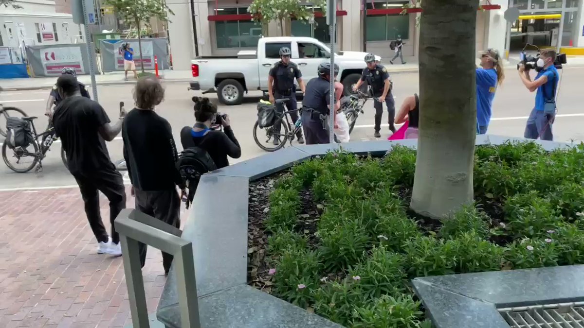 Arrest made on Bay. Police are trying to keep people on the sidewalk.