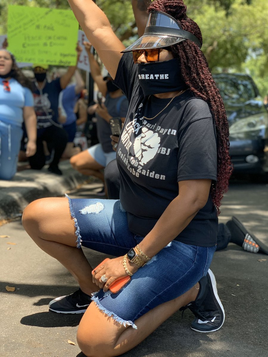 Peaceful protestors take a knee against police brutality in Lakeland's Munn Park. Crowds have grown; they remain peaceful