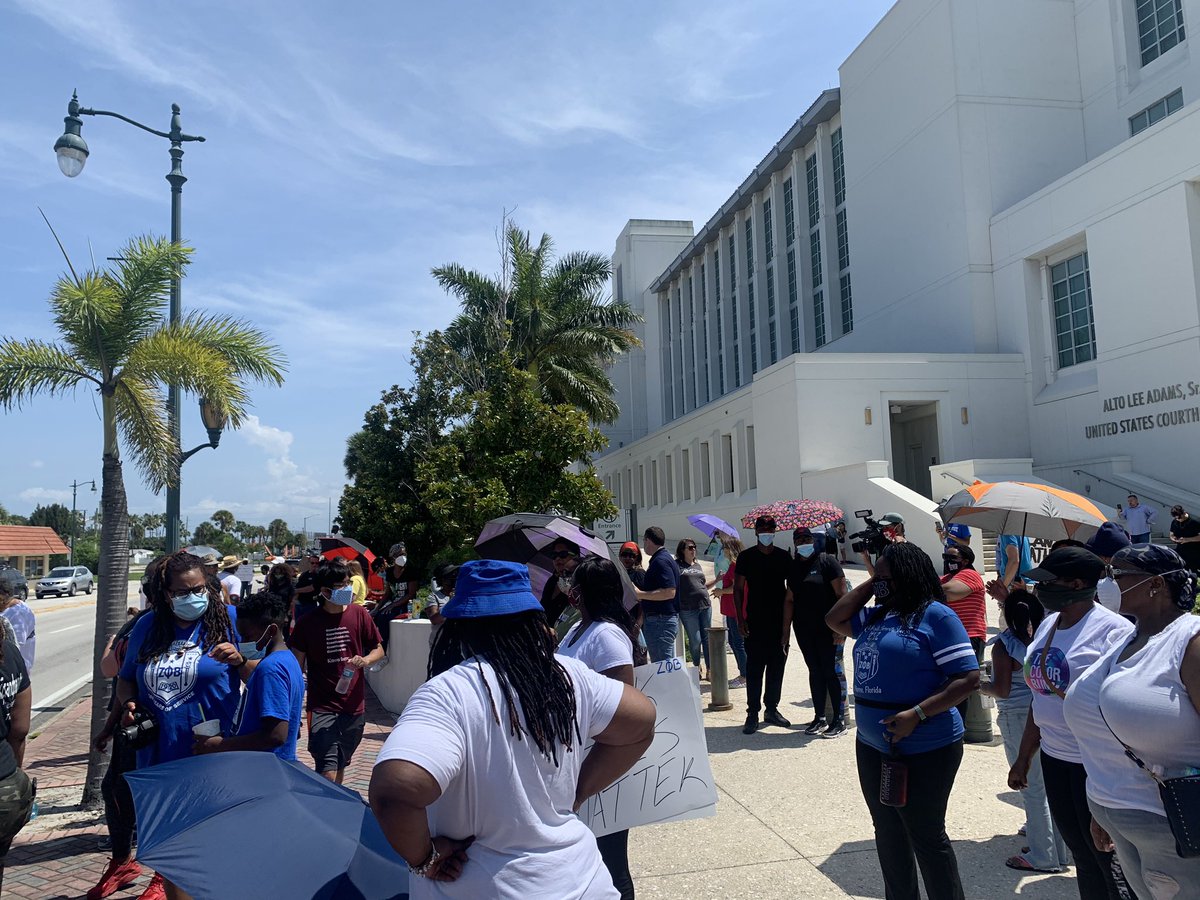 Outside the U.S. Federal Courthoise im Downtown Fort Pierce where more residents have gathered for a peaceful rally in response to the GeorgeFloydMurder