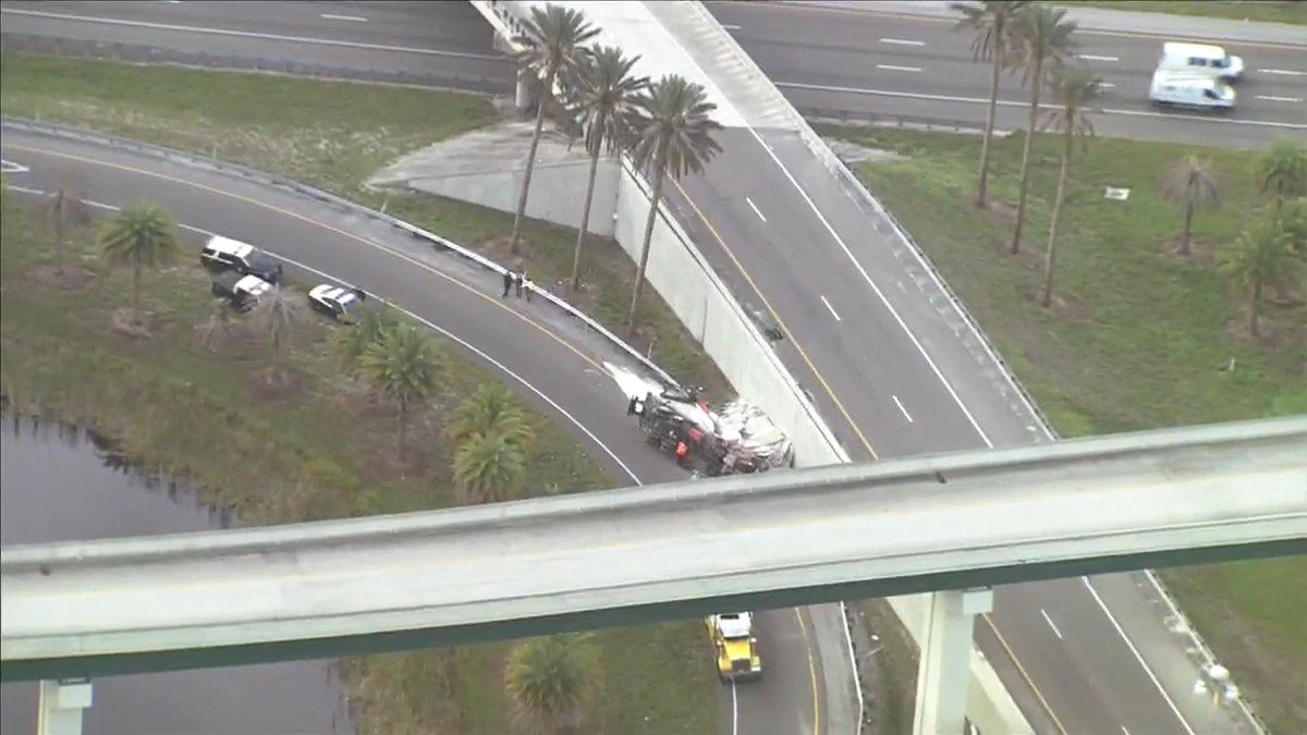 Our chopper is over the overturned semi on I-4 WB at the US-192 ramp. Ramp is CLOSED. ALT: Get off I-4 at Osceola Pkwy