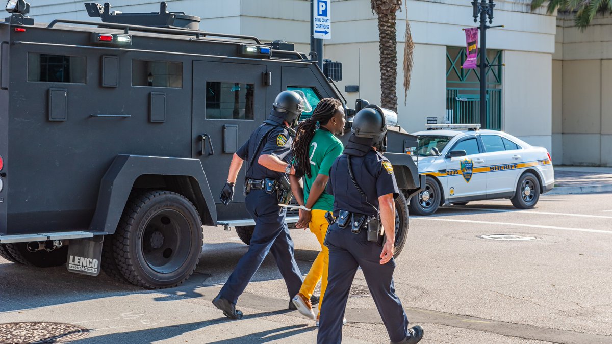 Confirms at least 22 arrests over the weekend for unlawful assembly. The people arrested range in age from 18-80. This was just one captured by our photojournalist Jerry McGovern on Sunday