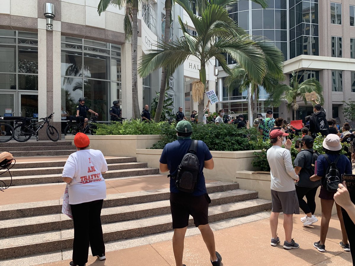 Hundreds of protesters gathered at City Hall in Orlando. No justice, no peace echoing here, along with a drum beat. A few dozen police officers are lined up in front of the doors