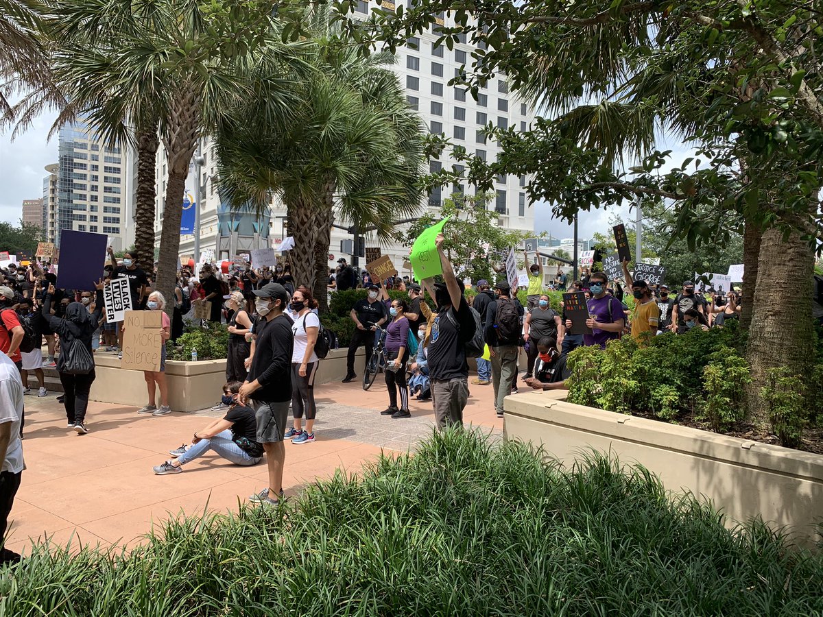 Hundreds of protesters gathered at City Hall in Orlando. No justice, no peace echoing here, along with a drum beat. A few dozen police officers are lined up in front of the doors