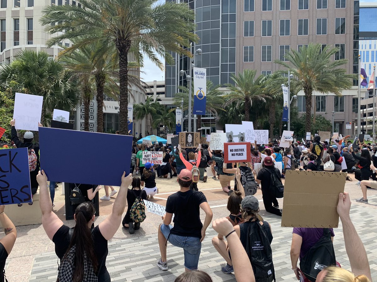 Hundreds of protesters gathered at City Hall in Orlando. No justice, no peace echoing here, along with a drum beat. A few dozen police officers are lined up in front of the doors