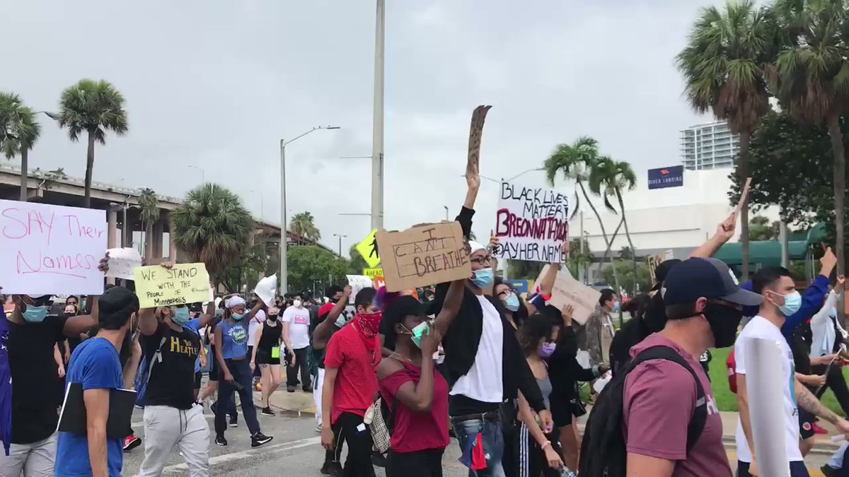 Closer to 200   outside Miami's detention center and courthouse. It's an organized march, leaders are adamant about remaining peaceful. About two dozen officers on other side of the police tape. All have remained silent amid the chants.