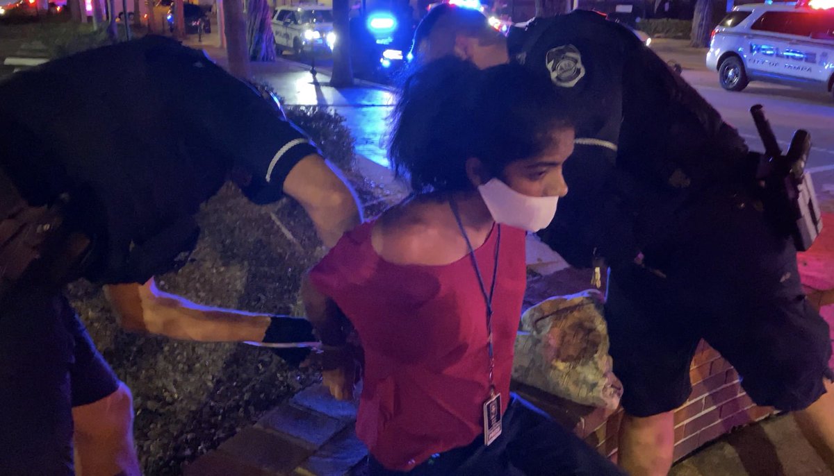 Places in cuffs and detained by @TampaPD while covering the protests in downtown Tampa even after identifying herself as a Times reporter. She was eventually released