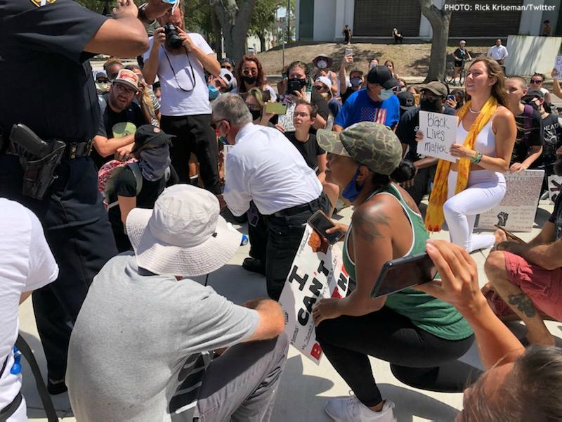 St. Pete Mayor Rick @Kriseman kneels at a JusticeForGeorge protest