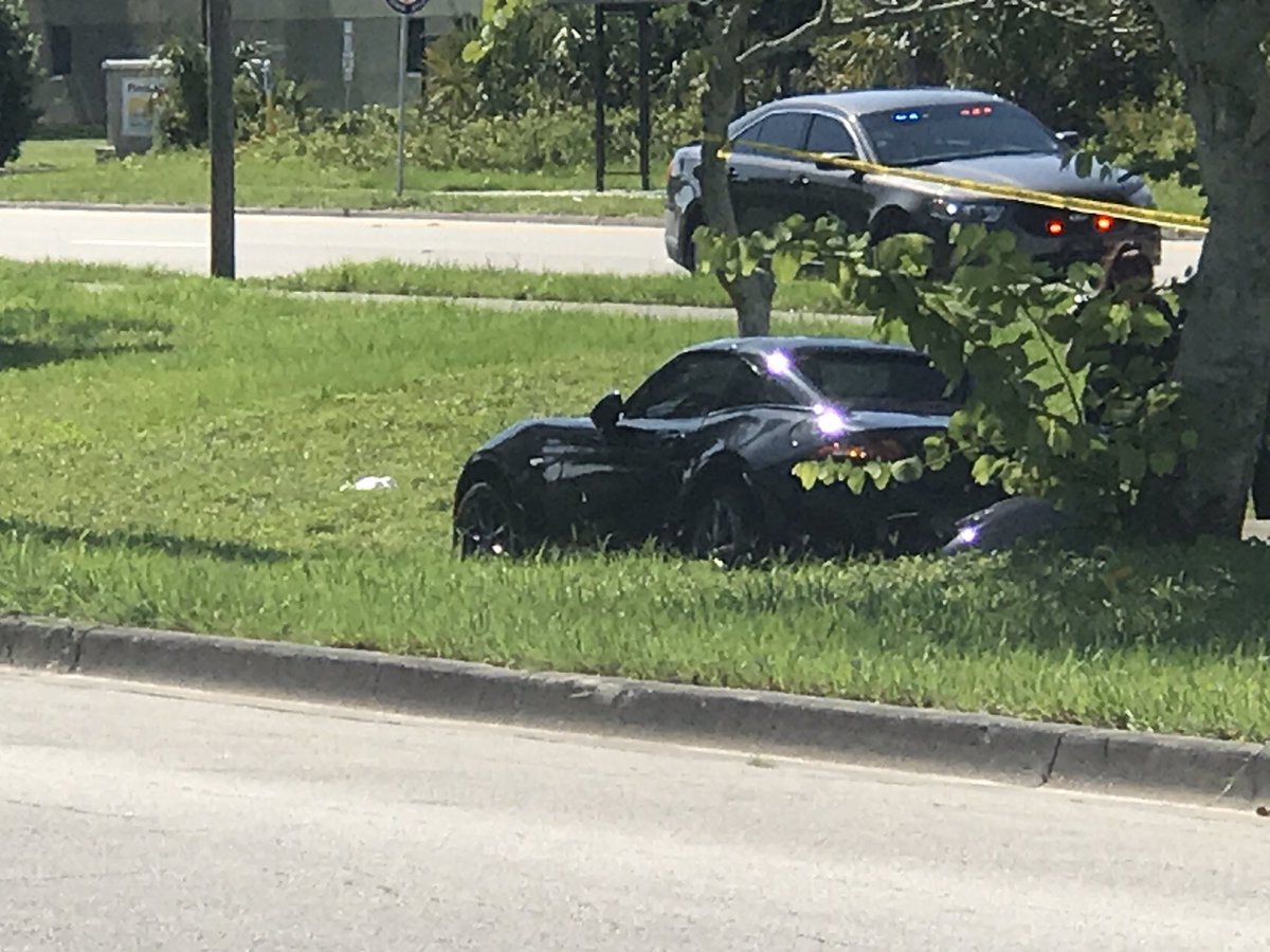 Detectives and CSI searching along University for shell casings. 