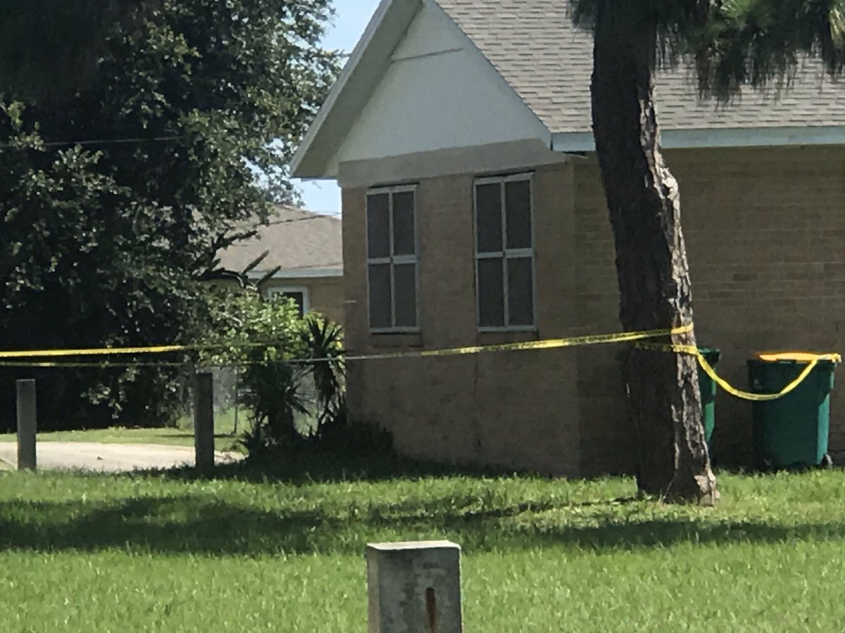 Detectives and CSI searching along University for shell casings. 