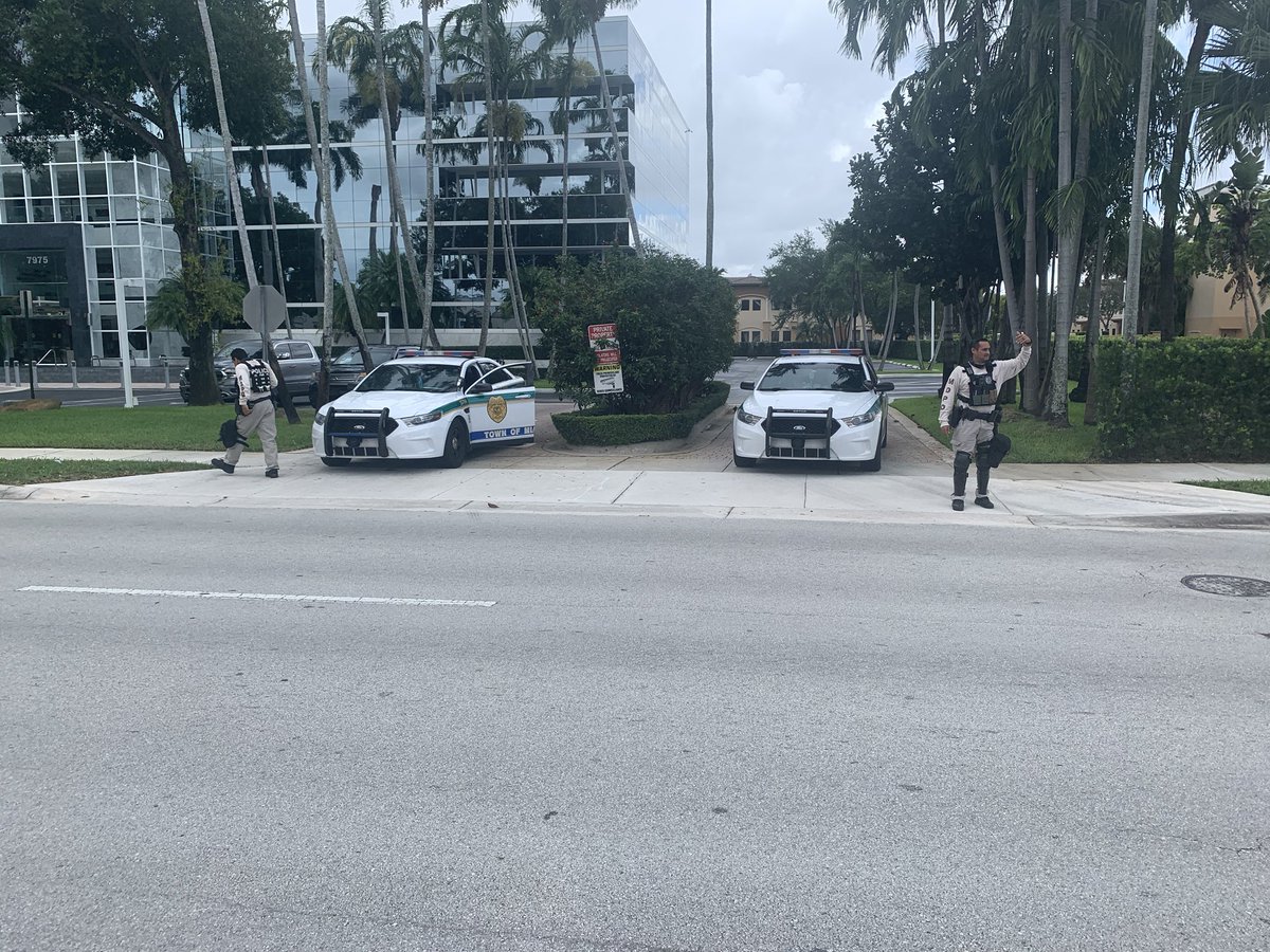 A couple Miami-Dade police officers are here monitoring. One of them just hugged one of the protesters