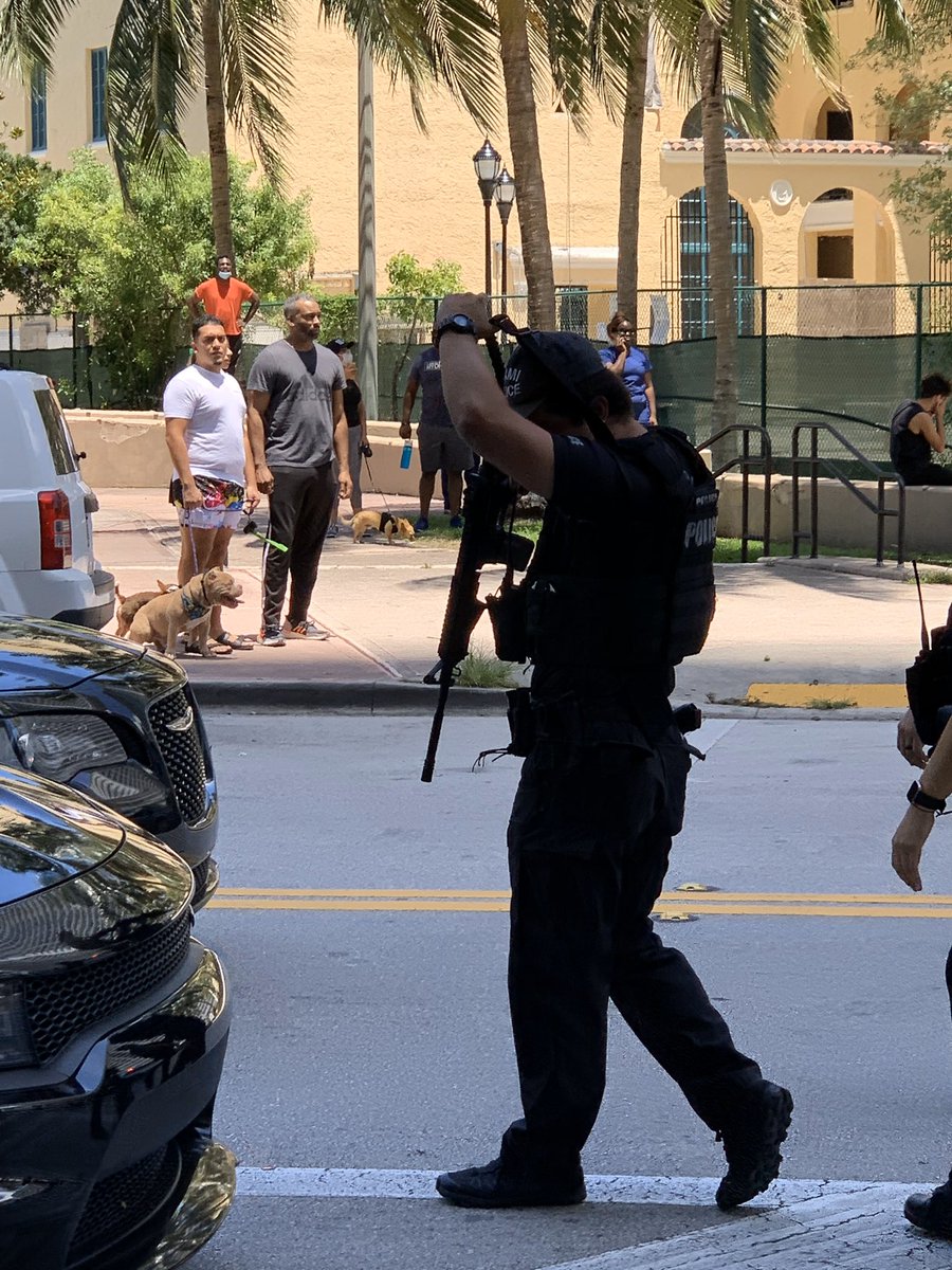 Big police scene in Edgewater area of Miami. @MiamiPD out with guns and people detained.