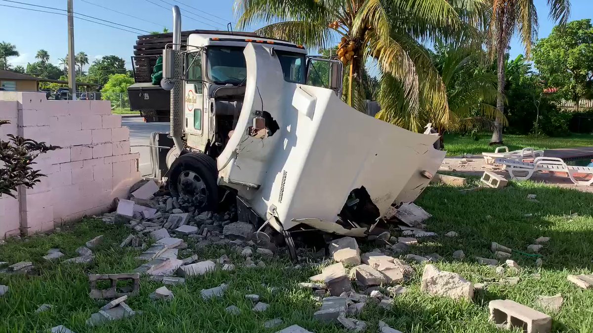 Truck driver dead after crashing into Royale Green backyard⁩