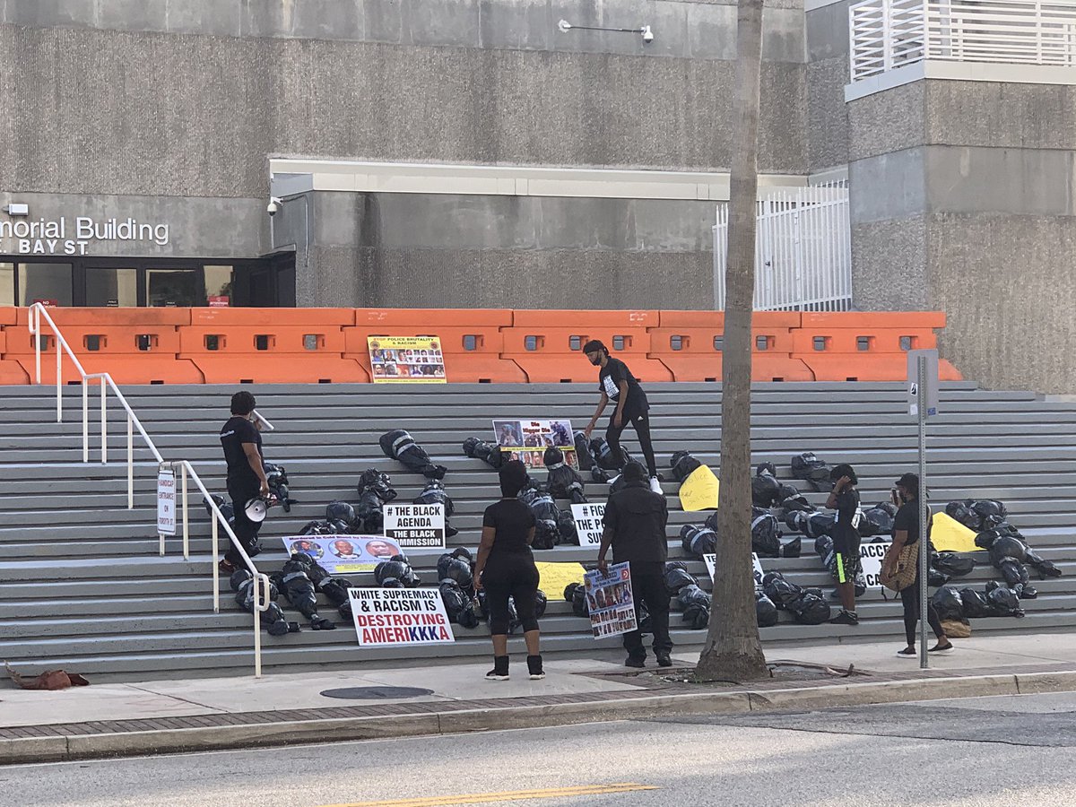 A local group activists setting up for protest outside JSO headquarters 