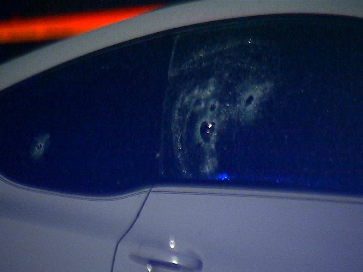 Here's a closer look at the bullet holes on the Hyundai. This is all on the passenger side door and window.