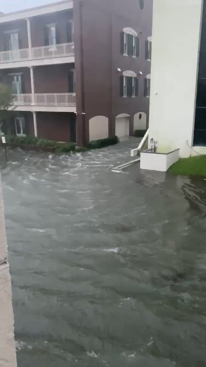 Water surge is still rising and yet still a slow moving storm , tons of rain just slashing across the Pensacola Bay