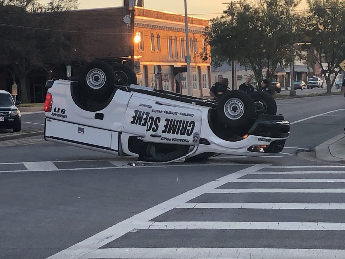 A Pensacola Police patrol car overturned this morning in a two-vehicle crash at N. Palafox and Wright streets.  officers only reported minor injuries