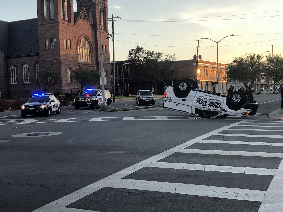 A Pensacola Police patrol car overturned this morning in a two-vehicle crash at N. Palafox and Wright streets.  officers only reported minor injuries