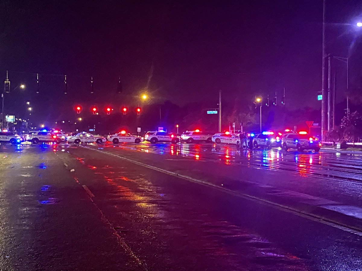 A large crowd stands in solidarity with protests in Cuba. Police closed Columbus Drive to traffic from Dale Mandy to Himes. Cuban flags, chants, and honking in this 10 pm hour