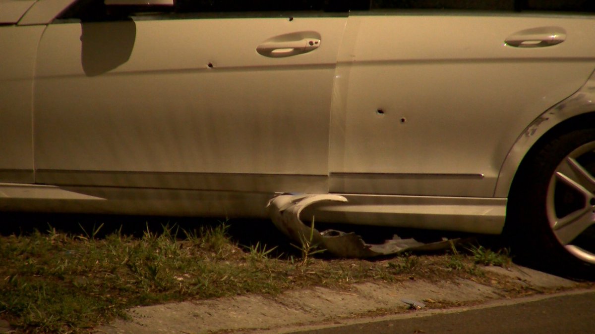 There are bullet holes and other areas of damage on the car where St.Petersburg police say a man was found dead