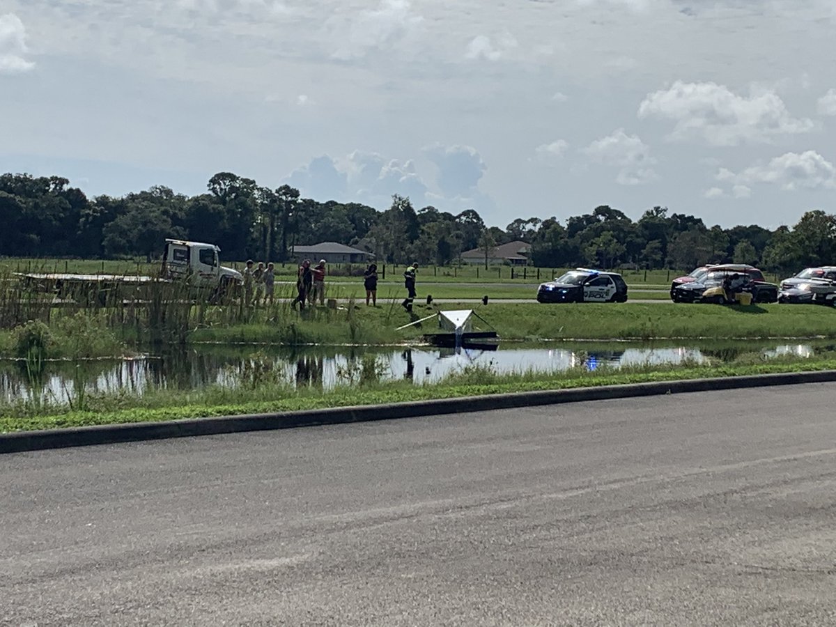 A small plane has crashed off the runway at Massey Ranch Airport. You can see the small plane in the water. 