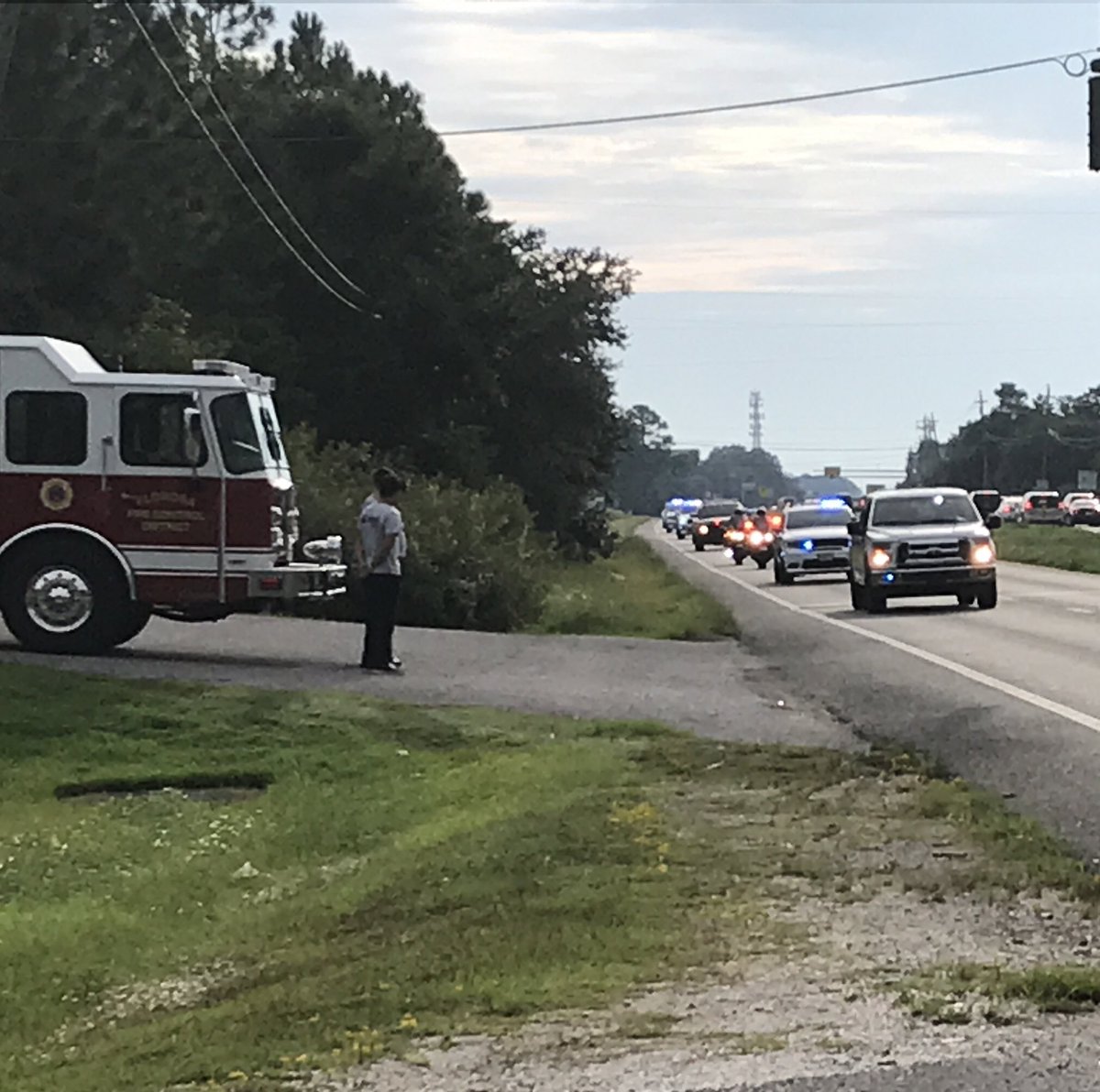 Okaloosa County Sheriff's Deputy Michael Neau is in route to his Barrancas National Cemetery on NAS Pensacola.
