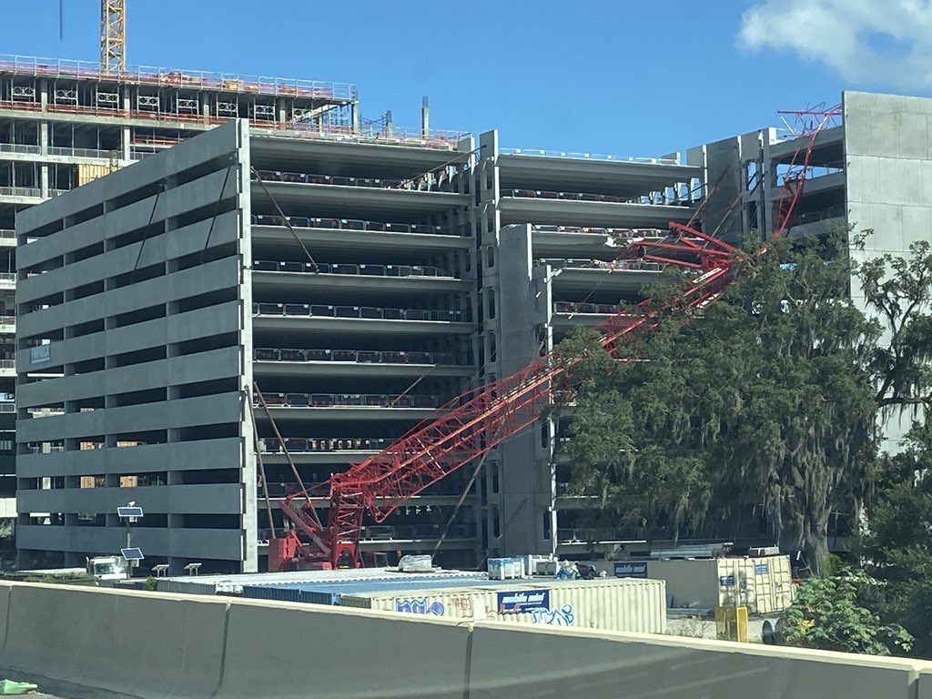 Close to a dozen people hurt when a crane collapsed onto a parking garage near AdventHealth, per Orlando Fire Dept