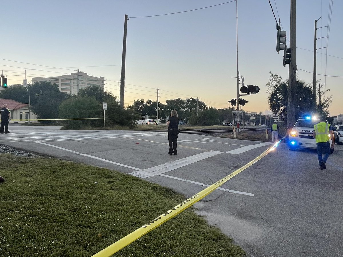 Images from this mornings fatal accident between a brightline train & this blue car. The car completely mangled and destroyed. This happened at SW 11th street &amp; S Dixie Hwy. Car is being towed &amp; police have left the scene