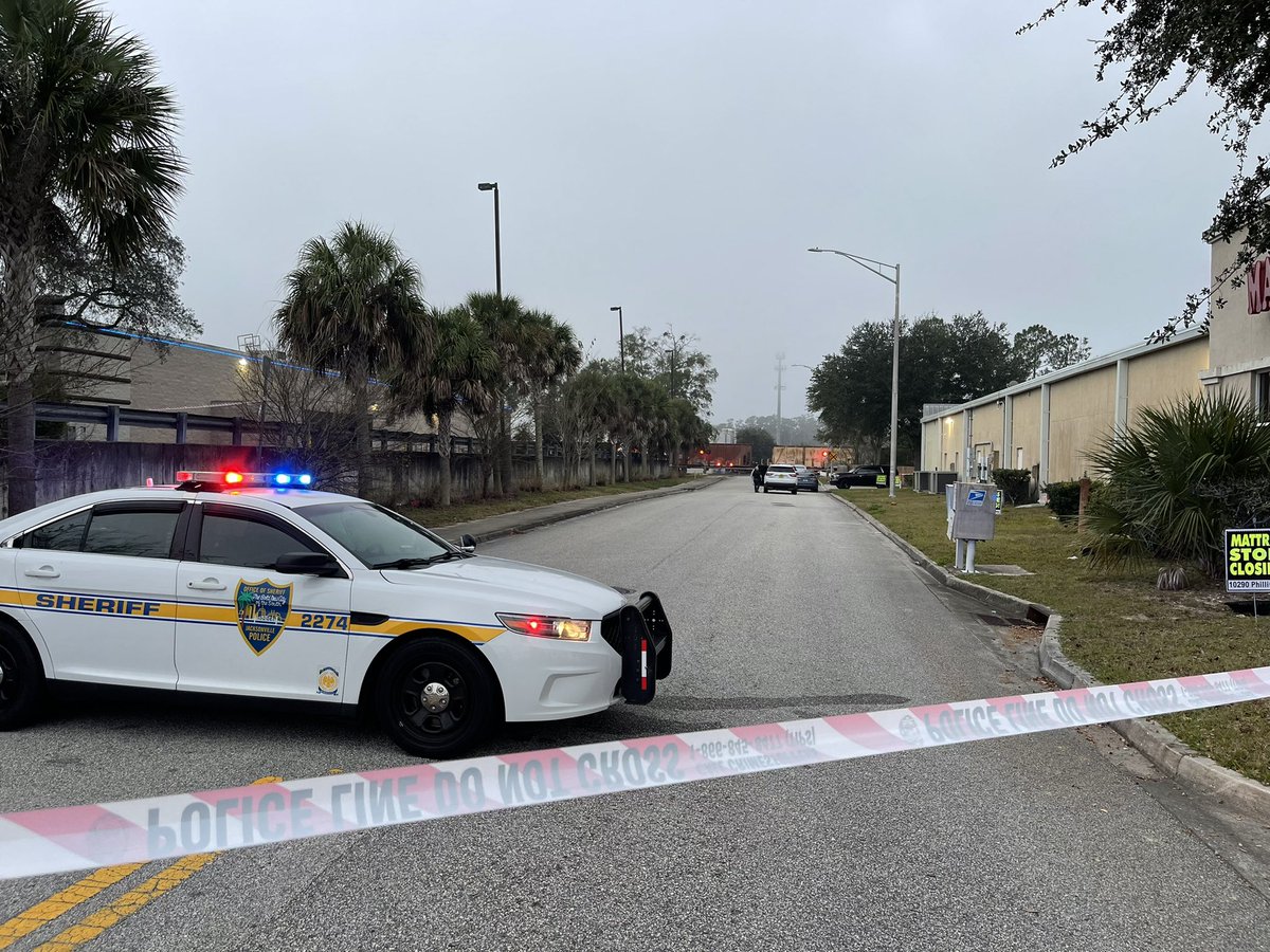 A train hits and kills a person on tracks near Philips Highway and Mussells Acres Road.