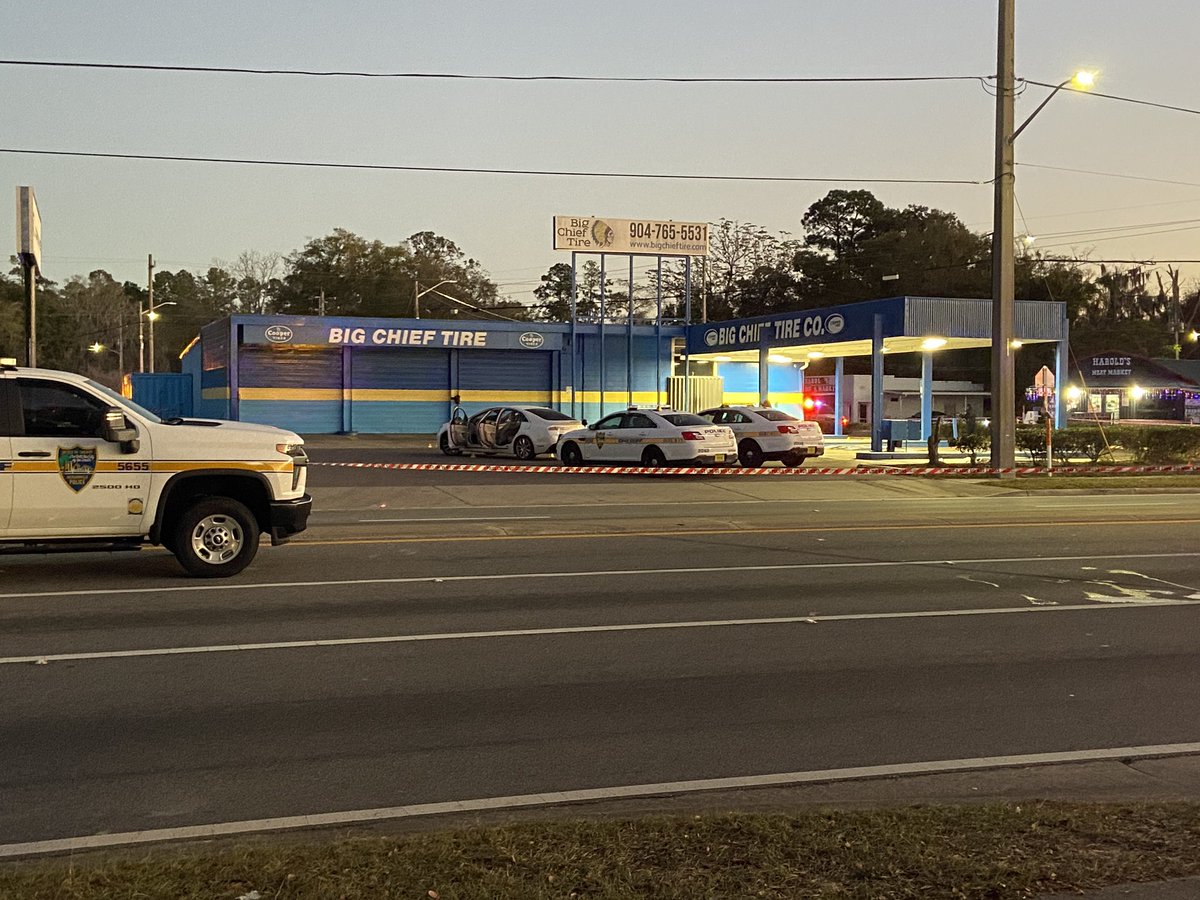 Another look at the scene this morning where JSO says officers exchanged gunfire with a passenger in this white sedan. It was a traffic stop that led to the shooting. Deputies noticed a passenger in this car wearing a bulletproof vest and later noticed he had a gun