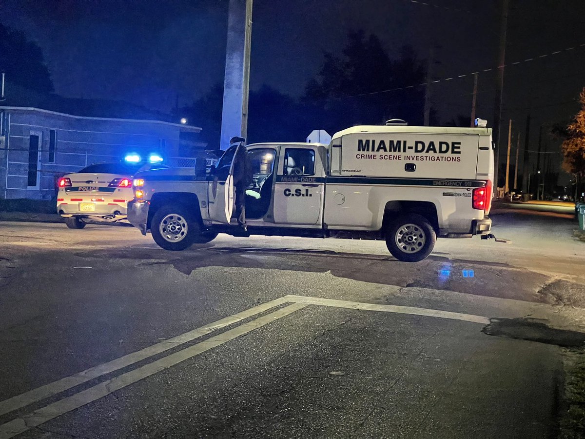 Three people injured overnight after drive-by shooting in NW Miami-Dade. @MiamiDadePD placing evidence markers near silver car on NW 58th St near 23rd Ave. Man and woman found shot at the scene. Third victim drove himself to hospital.