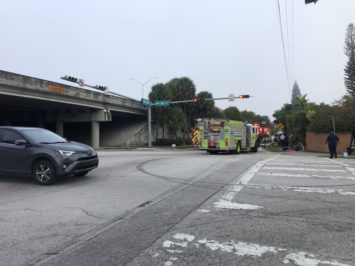 Firefighters & police closing off NW 6 Ave just beyond NW 151st street after a bad crash/car fire. We were initially told someone was trapped in the car and they were removed 