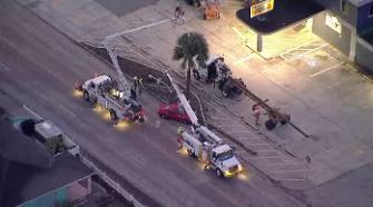 TrafficAlert Tampa Sky 10 over a crash shutting down lanes of W. Columbus Ave between Rome and Albany Ave after a car crashed into a pole