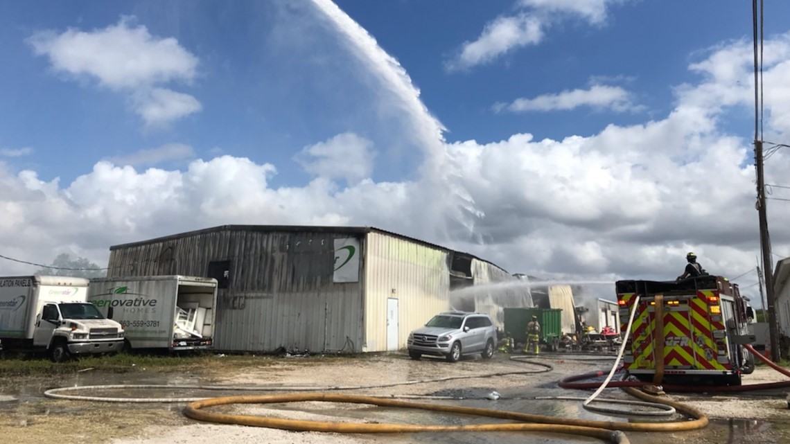 Firefighters work to put out two-alarm fire at Lakeland business