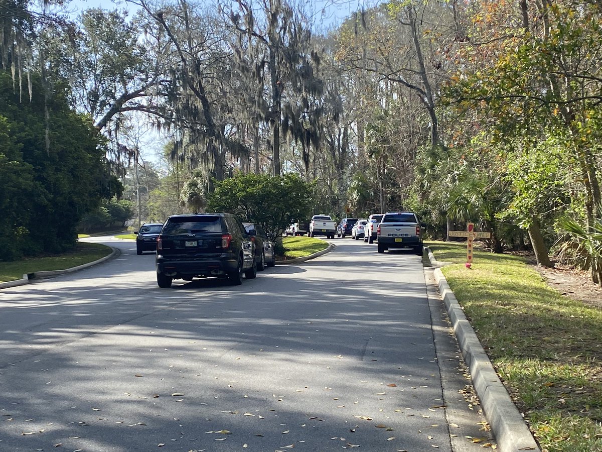 Jacksonville Beach Police officers are searching wooded area west of Sanctuary Blvd, between Jacksonville Dr & J Turner Butler Blvd near spot where a 33 yr old father was shot &amp; killed last Wed. Officers are making sure they didn't miss anything