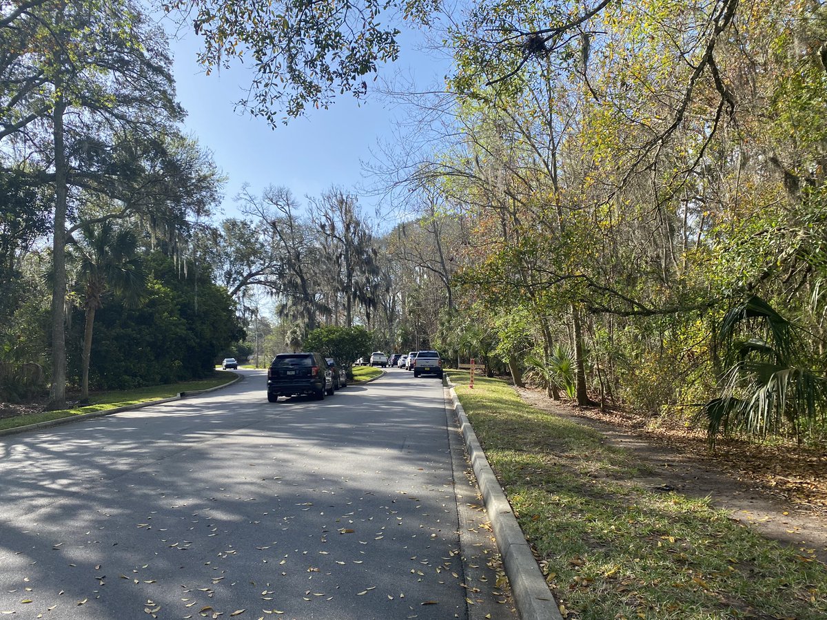 Jacksonville Beach Police officers are searching wooded area west of Sanctuary Blvd, between Jacksonville Dr & J Turner Butler Blvd near spot where a 33 yr old father was shot &amp; killed last Wed. Officers are making sure they didn't miss anything