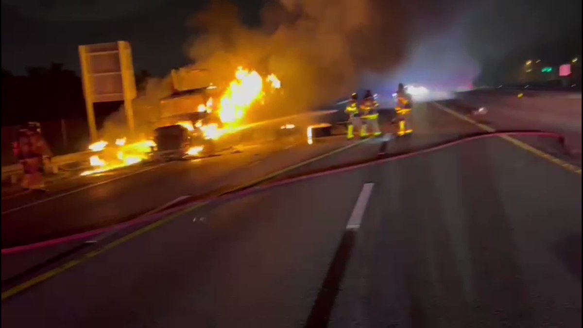 Palm Beach Florida Firefighters responded to a tractor trailer on fire on NB TP near Glades Road.  the occupants got out safely; no injuries.  All 3 lanes were shut down for safety while firefighters battled the blaze