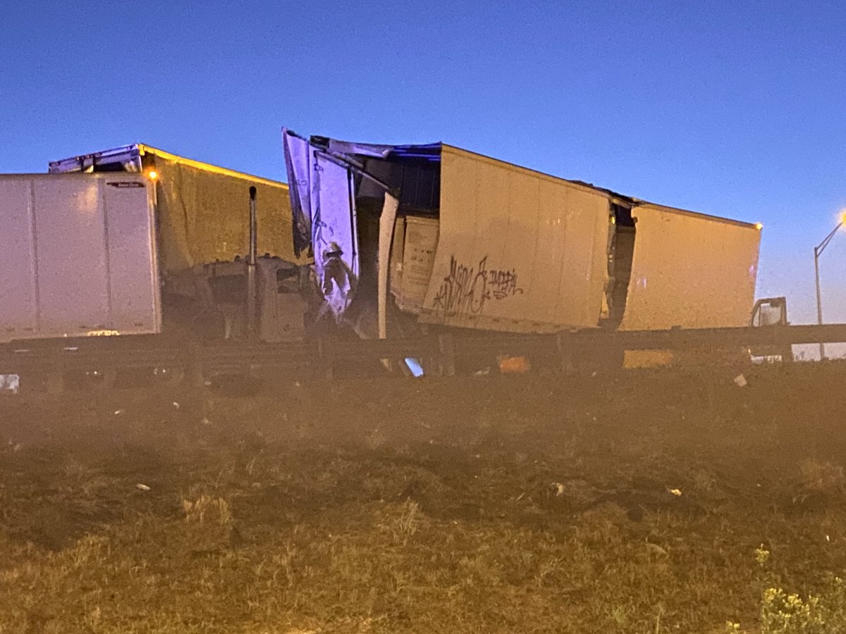 This is the wreck that claimed two lives on I95 this morning. You can't see it, but there's a car pinned between those two semi trucks, and the front semi has been split in half