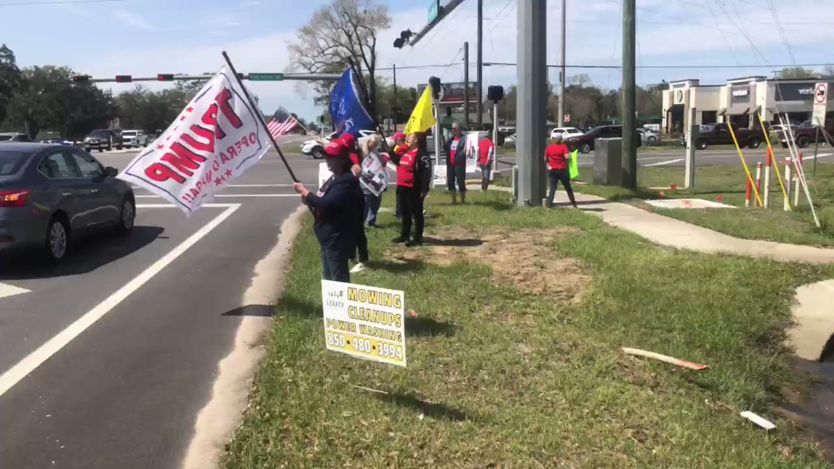 A protest underway on the corner of Nine Mile & Pine Forest Roads. Participants are protesting what they call unwarranted inflation caused by the Biden administration.