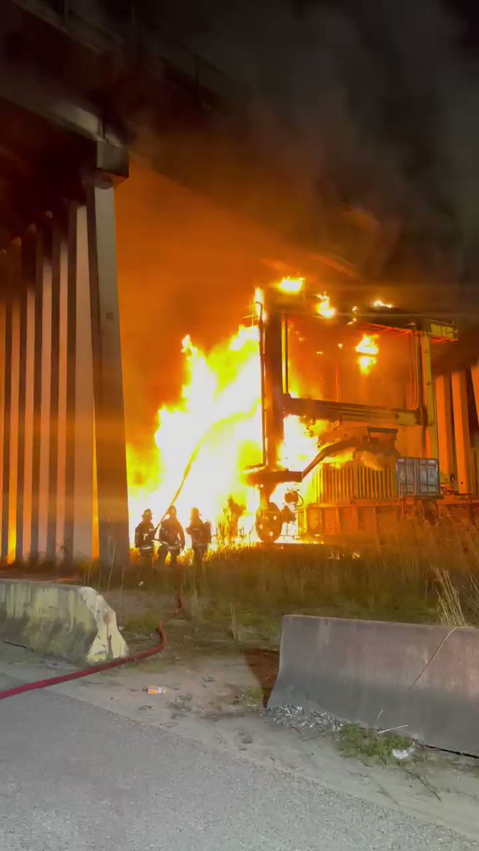 Crews work to put out a fire at the rail yard under the bridge at Edgewood Ave. and New Kings Rd.  The bridge is shut down to traffic